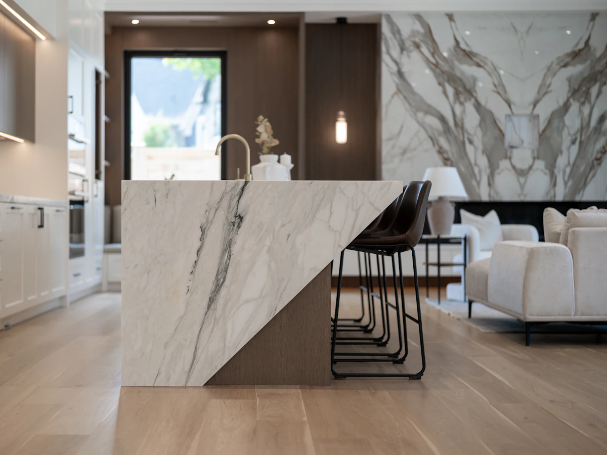 A modern kitchen with a marble island